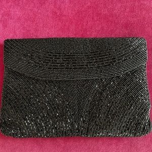 Woman’s Black Beaded Evening Clutch